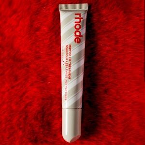 NIB Rhode Peptide lip treatment in Pepperment Glaze